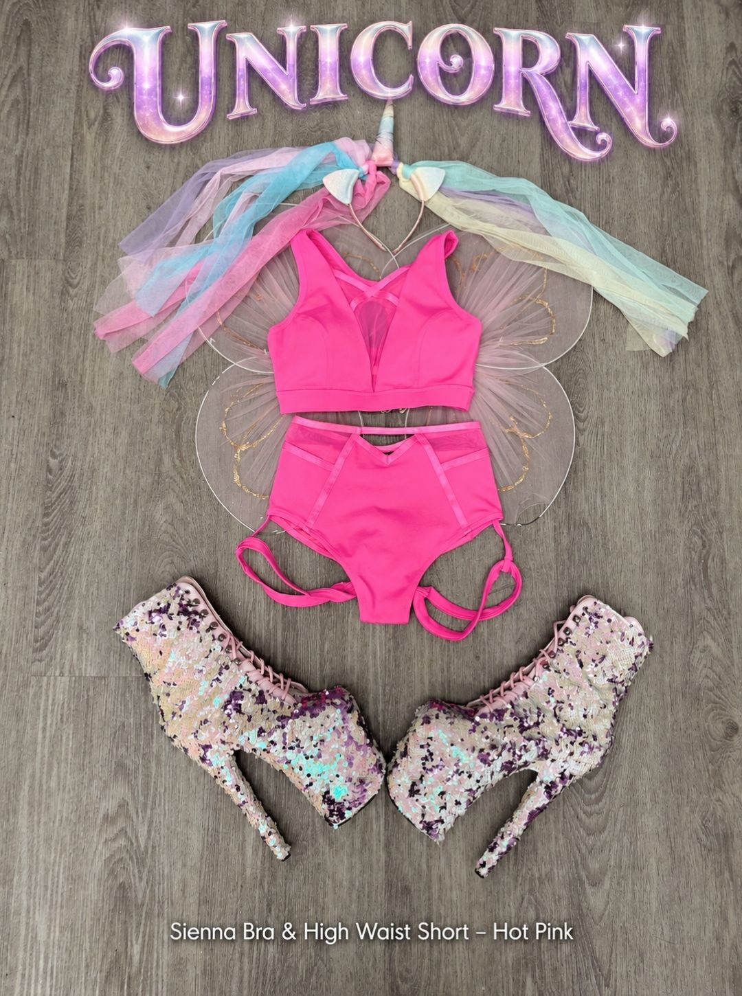 Unicorn Halloween pole costume flat lay with the RARR Sienna Bra and High Waist Short in Hot Pink, rainbow unicorn headband, fairy wings and sequin platform boots
